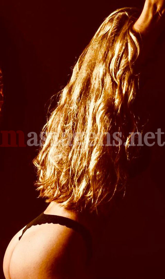 Foto vertical Massagista Isabella